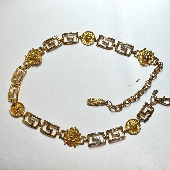 Vintage Made in Korea Exp Gold Lion Belt excellent condition 28-35” length